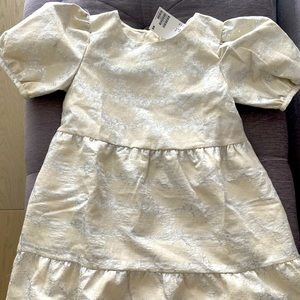 H&m dress holiday collection.  Brand new with tags. Beige and silver